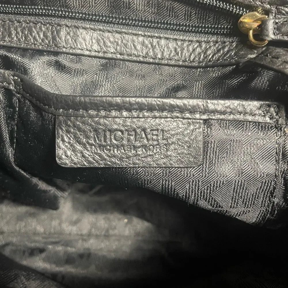 Michael Kors Black Leather Shoulder Bag with side drawstring gold tone hardwares